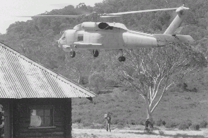 Navy helicopter delivering hardware, photo John Hamilton