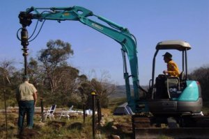 Drilling the post holes